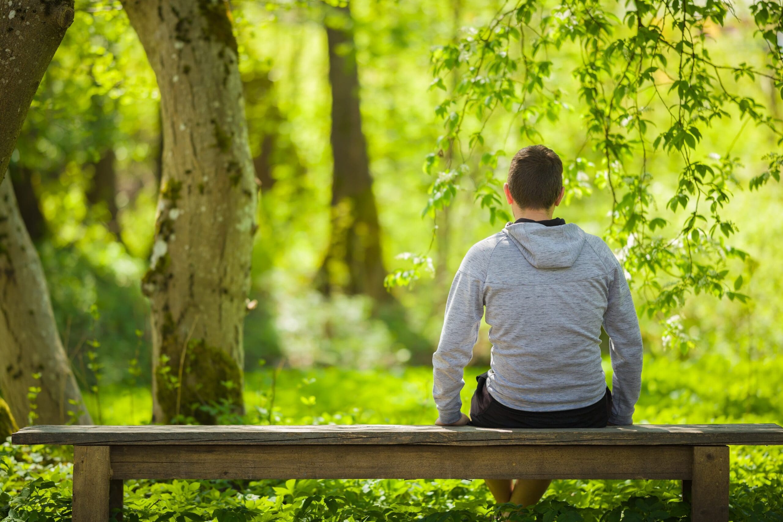 https://comfortrecoveryllc.com/wp-content/uploads/2025/07/A-calm-introspective-person-sitting-on-a-bench-surrounded-by-nature-scaled.jpg?utm_source=chatgpt.com