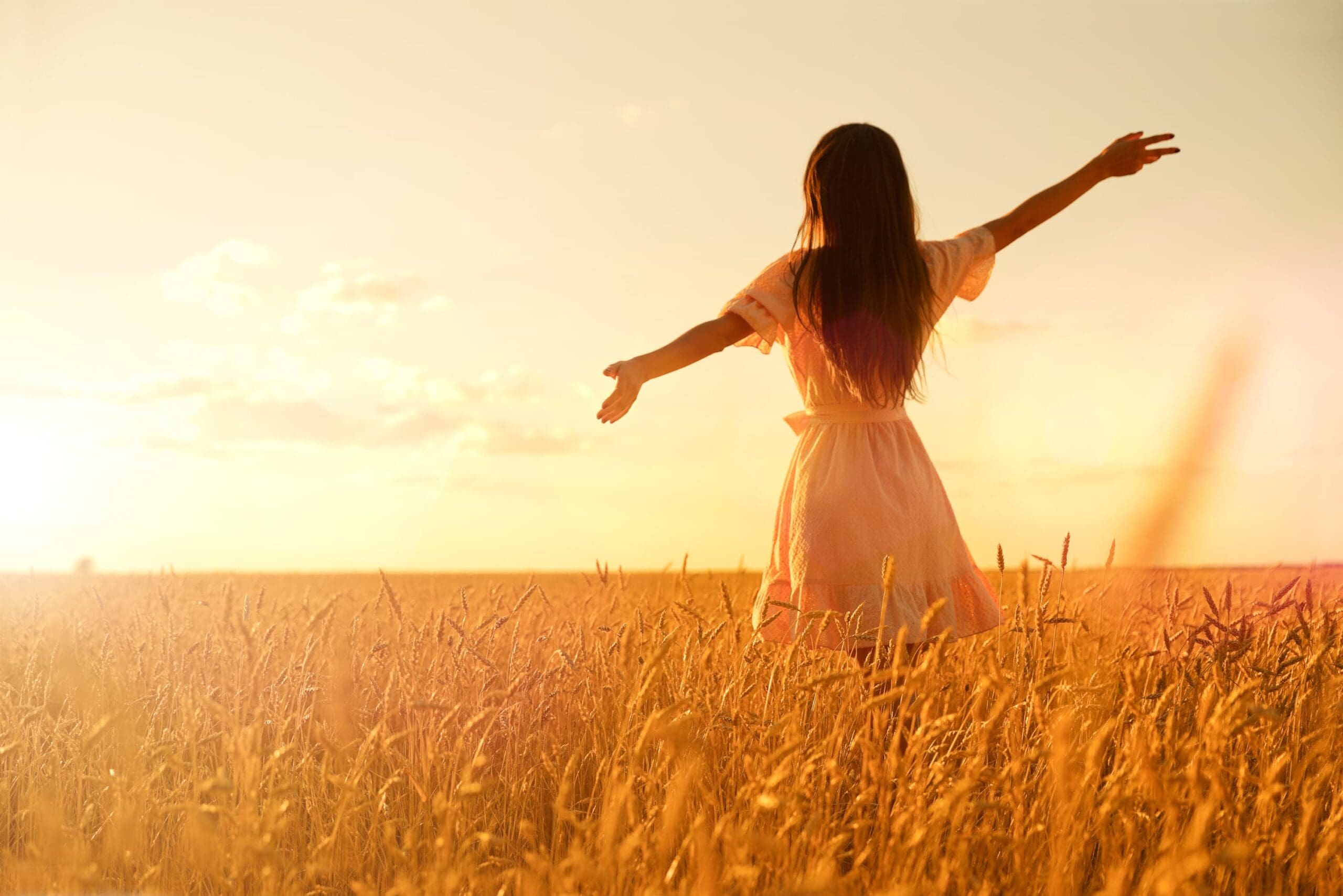 person walking forward in nature representing recovery and new beginnings