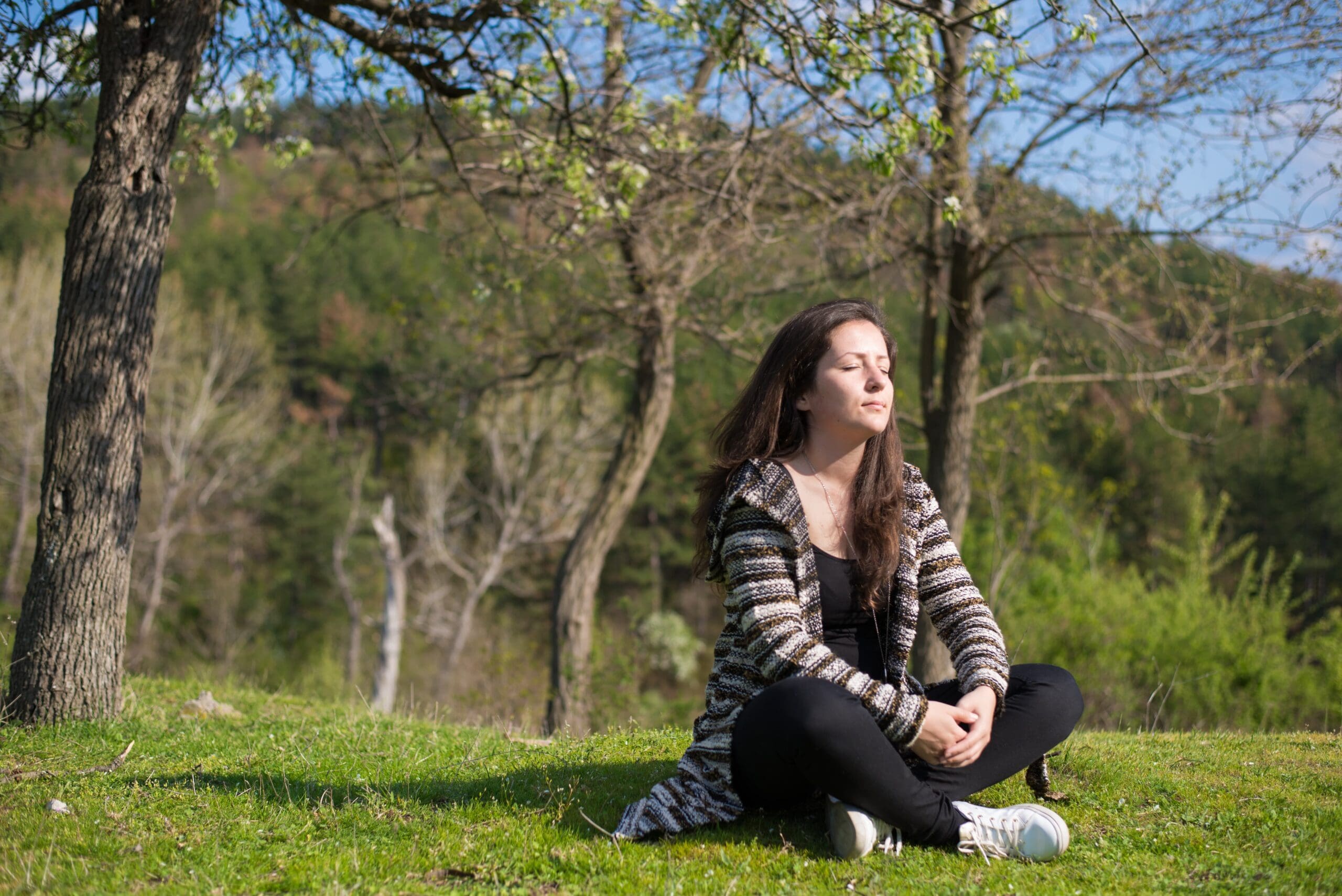person experiencing peace in nature during recovery journey away from home