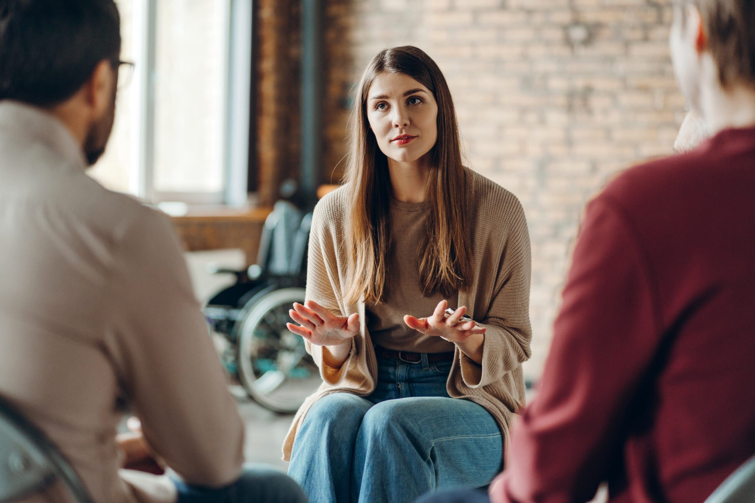 Group therapy session representing acceptance in alcohol addiction recovery