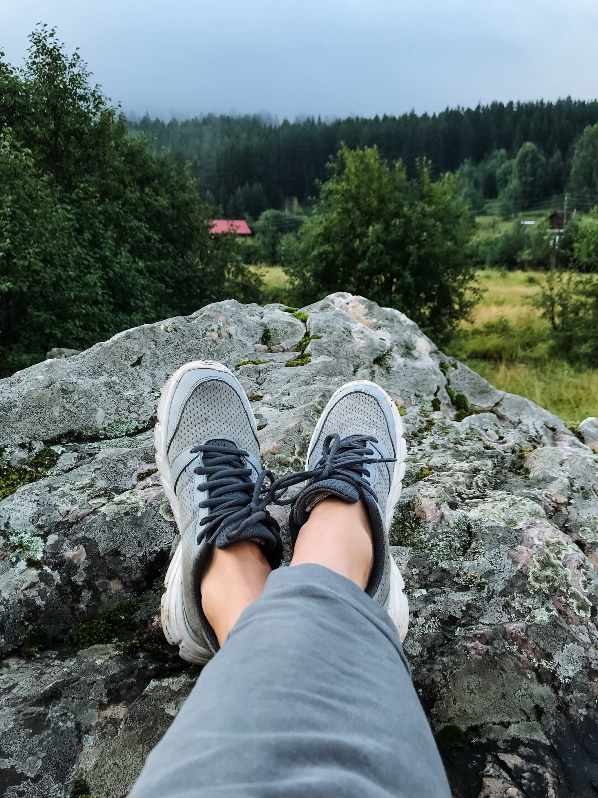 sober traveler enjoying peaceful mountain view during first vacation after rehab