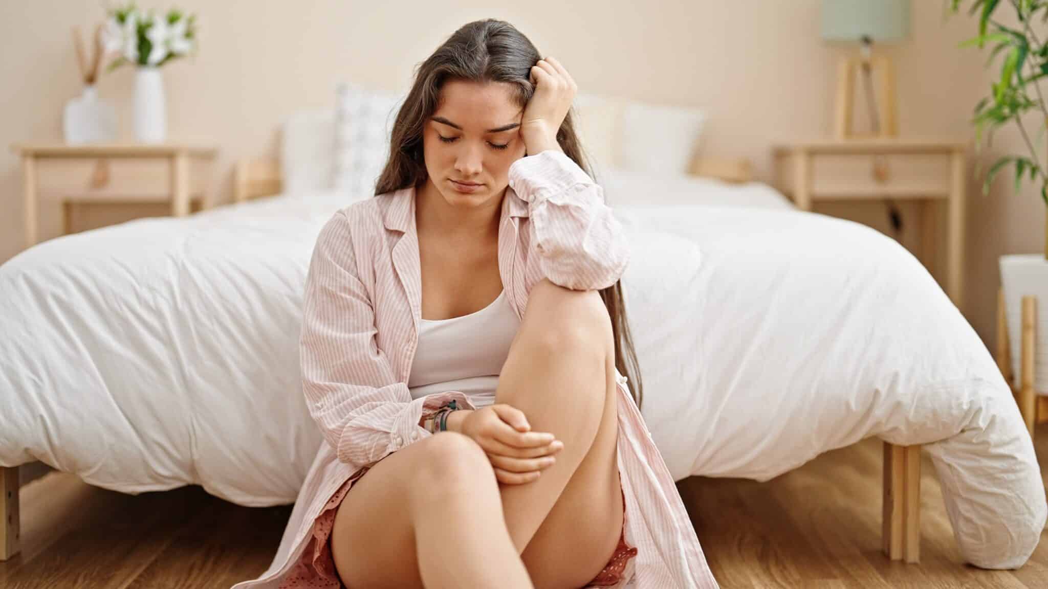 Person experiencing emotional flooding and learning to recover in addiction recovery